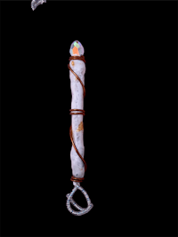 a white wand is hanging on a black background