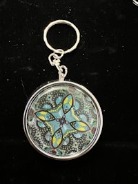 a keychain with a colorful design on it