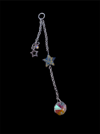 a chain with a star and a star shaped charm