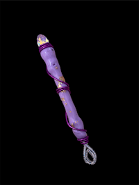 a purple glass wand on a black background