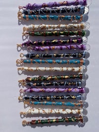 a group of bracelets with different colors and designs