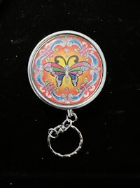 a keychain with a colorful design on it